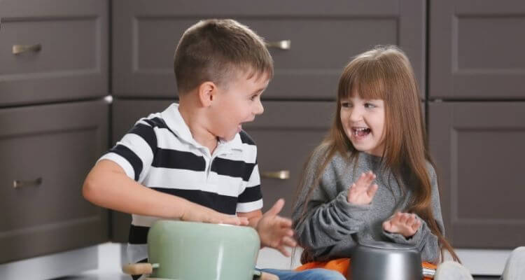 Kids beating the sound of each word. Counting syllables.