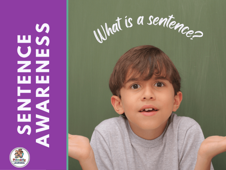 Young boy in classroom with question about sentences on chalkboard.